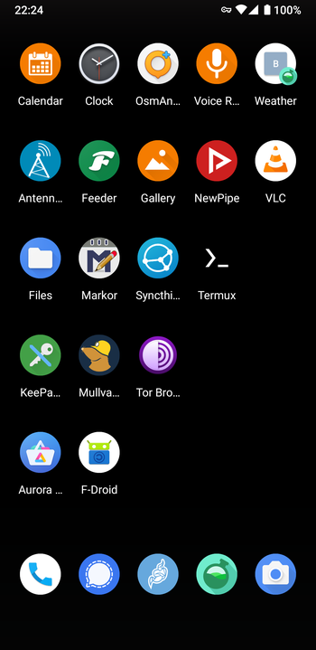 The GrapheneOS home screen with black background and numerous apps